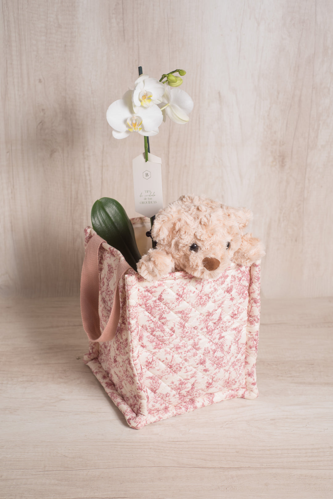 Juguetero Rosado con orquídea