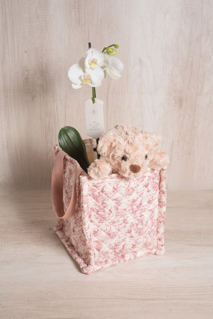Juguetero Rosado con orquídea