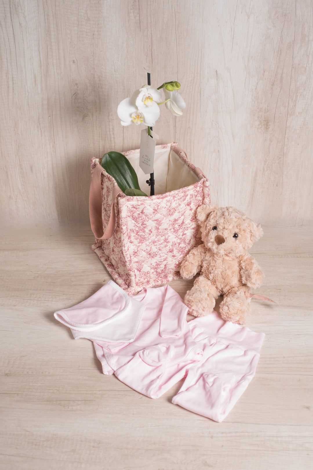 Juguetero Rosado con orquídea
