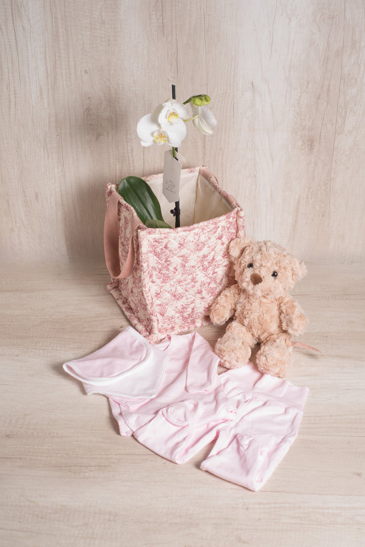 Juguetero Rosado con orquídea